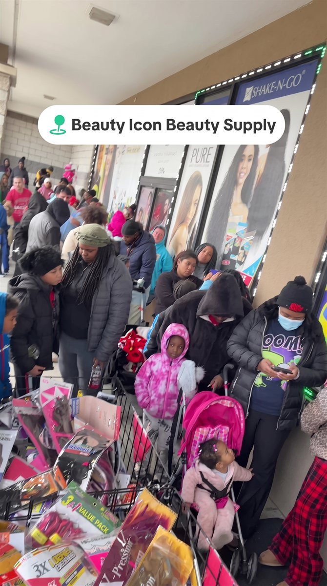Customers lined up outside Beauty Icon Beauty Supply on a busy sale day